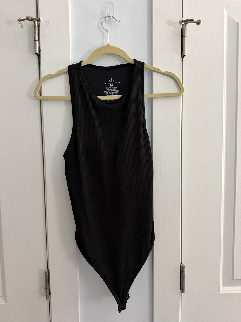 Klassy Network Black Ribbed Sleeveless Bodysuit